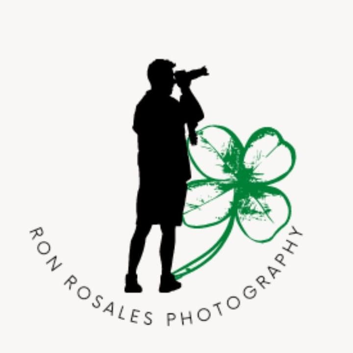 Ron Rosales Photography mark: a photographer silhouette beside a four-leaf clover